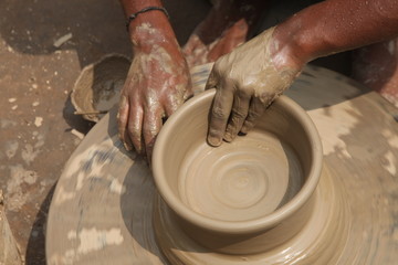 Potter at work, clay molding, man work clay, potter man