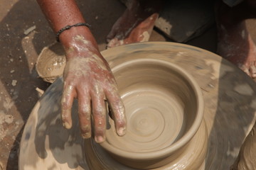 Potter at work, clay molding, man work clay, potter man