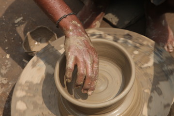 Potter at work, clay molding, man work clay, potter man