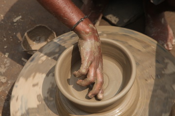 Potter at work, clay molding, man work clay, potter man