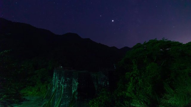 A photo of a historic dam and the Milky Way in Kanonji City, Kagawa Prefecture, Japan	