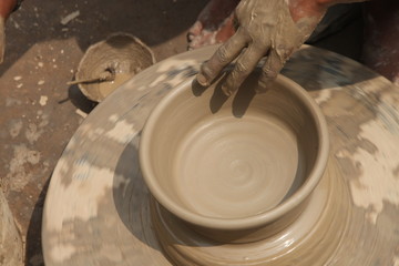 Potter at work, clay molding, man work clay, potter man