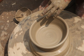 Potter at work, clay molding, man work clay, potter man
