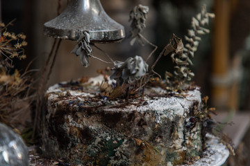 Close-up of Dried flowers on Mockup cake gone mouldy. Vintage shop decoration idea. Focus and blur.