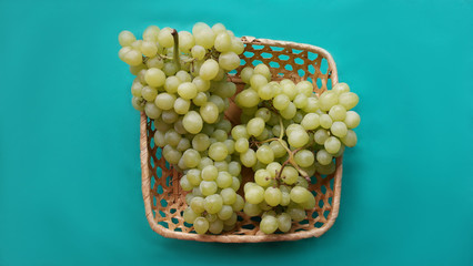 Ripe bunches of green grapes close-up.