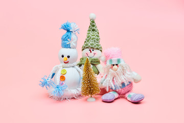 christmas decoration on pastel pink background, copy space