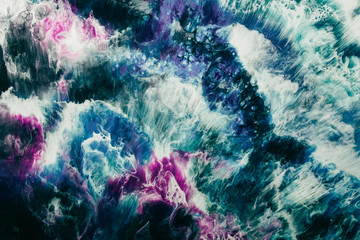 Colorful alcohol ink water. Marble texture. Blue purple gradient streak effect. Abstract undersea coral reef design. Fantasy mineral stone pattern nature art background.