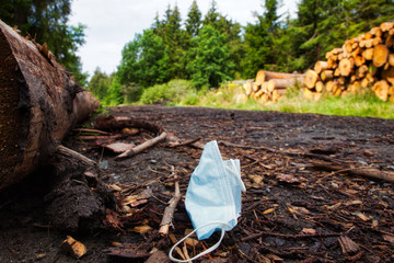 lost mouth nose protection on a forest hiking path