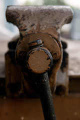 metal old vise tool set on rusty layout