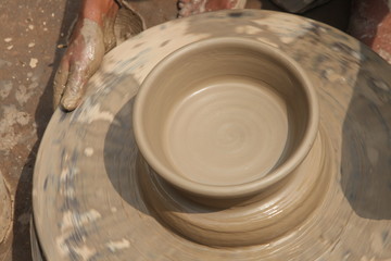 Potter at work, clay molding, man work clay, potter man