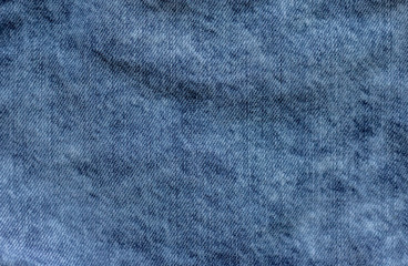 Old blue denim.The texture of the fibers of the denim.