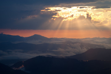 Misty sunrise in the mountains