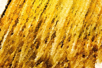 Abstract golden light waterfall. Abstract glowing background for design and decoration