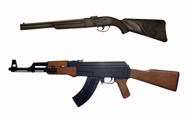 There are a rifle and an ak-47. White background. Isolated.