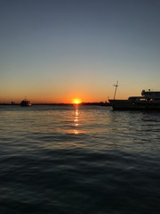 Naklejka premium sea photo sunset boat 
