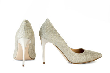 Women's red shoes from a varnish on a white background