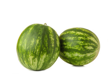 Two fresh watermelons isolated on white background