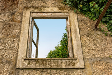 Weathered And Derelict Window Showing Roofless Interior, Braga, Portugal