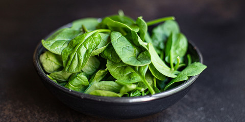 spinach green juicy leaves organic salad serving size natural product top view copy space  for text...