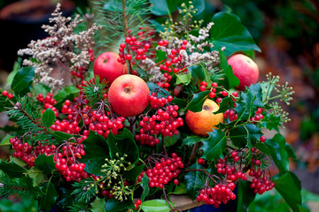 Winterly Decoration With Ilex And Apples