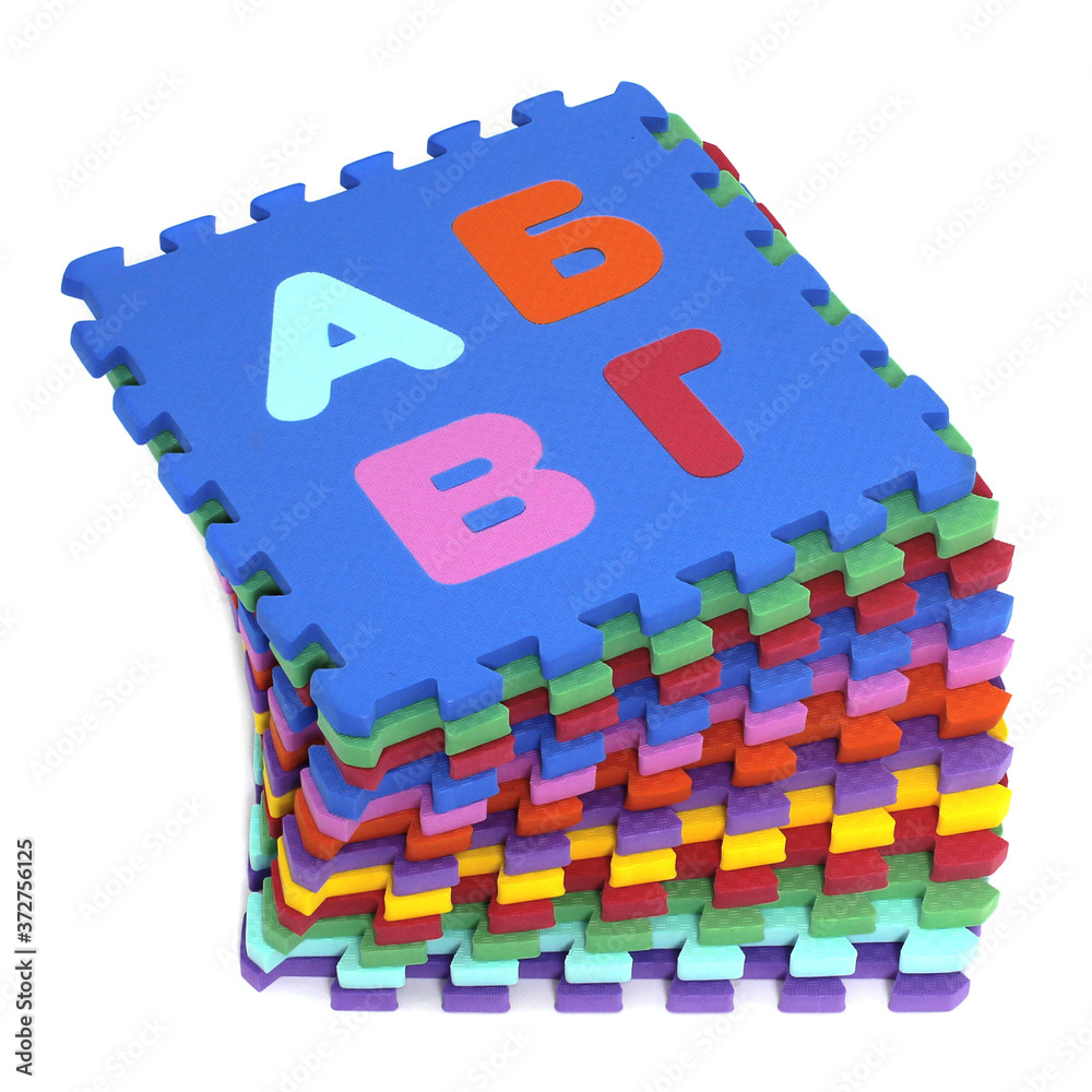 Poster puzzle mat - multicolored soft elements letters and numbers on a white background
