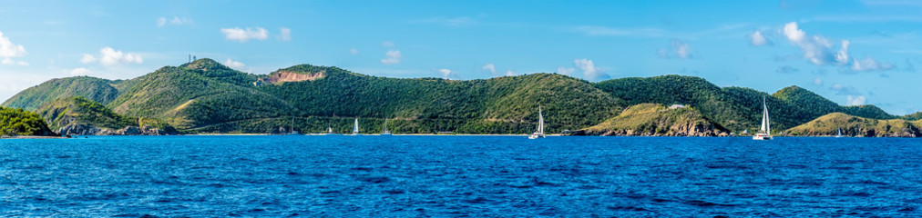 A panorama view across Peter Island of the main island of Tortola