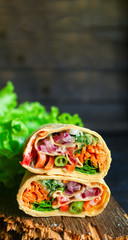 tortilla wrap vegetables burrito stuffing lavash vegetarian pita bread Menu concept Takeaway serving size fast food background top view copy space portion
