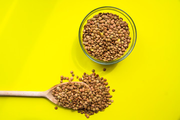 Buckwheat in a wooden spoon.