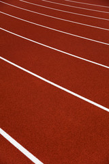 Red stadium running tracks closeup