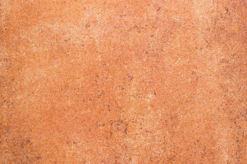 Surface of an old ceramic tile in italian style with a brown abstract pattern.