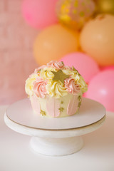 Pink smash cake for first birthday