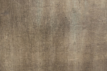 Fototapeta na wymiar abstract brown texture with cracks. Pattern of dark wood on cut of tree