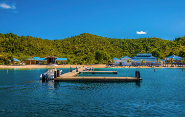 Fototapeta na wymiar A view across the landing bay on Norman island off the main island of Tortola