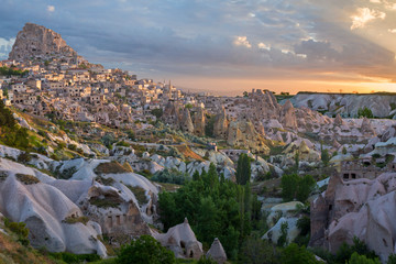 Rock formations and cave dwellings in the old town Uchisar, Cappadocia, Turkey