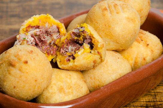 Portion of pumpkin dumpling with dried meat