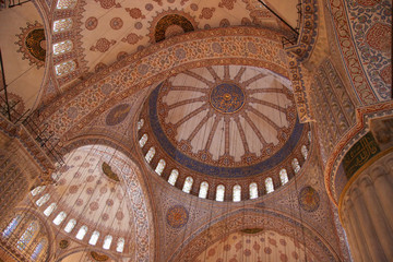 Fototapeta na wymiar Arches and domes of Blue Mosque with islamic patterns, Istanbul, Turkey