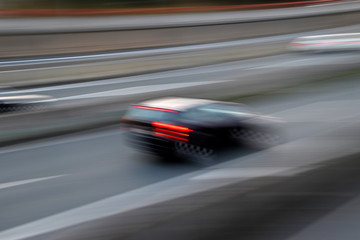 Fototapeta na wymiar Driving fast in a highway