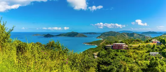 Fotobehang A view from Ridge Road towards the islands of Guana, Great Camanoe and Scrub from the main island of Tortola © Nicola