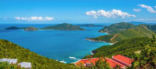 A view over the roof tops of Tortola towards the islands of Guana, Great Camanoe and Scrub