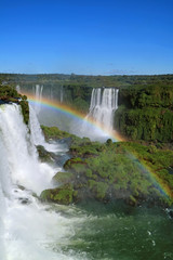 Fototapeta premium Fantastic Rainbow over the Powerful Brazillian Side Iguazu Falls, Foz do Iguacu, Brazil, South America