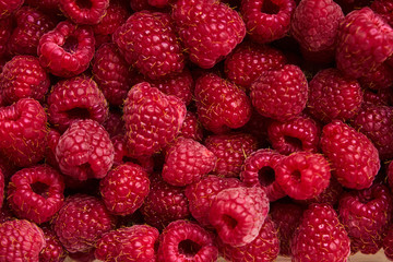 Raspberry berries close-up, background