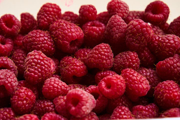 Raspberry berries close-up, background
