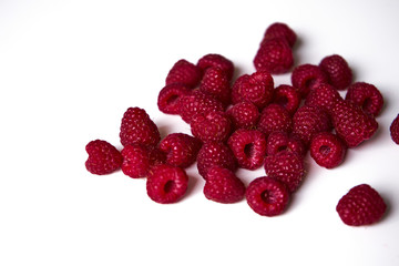 Raspberry on a white background, close-up