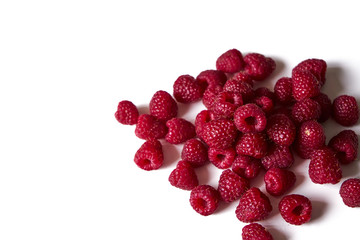 Raspberry on a white background, close-up