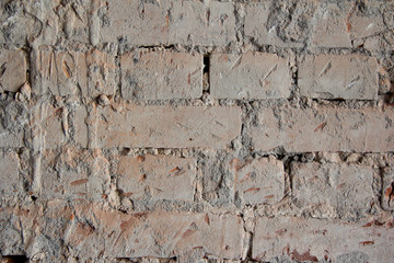 The background is made of brick walls. Brickwork on the wall of the building.