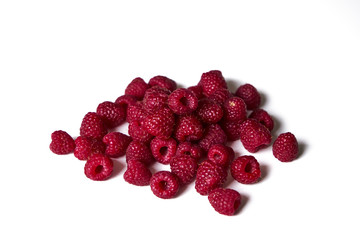 Raspberry on a white background, close-up
