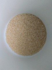 raw rice in the bottom of the pot