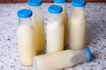 Frozen milk on the kitchen table.