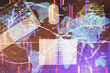 Business theme hologram drawings over computer on the desktop background. Top view. Multi exposure. Concept of international connections.