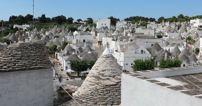 Cityscape of Alberobello old town with conical roofs in Italy